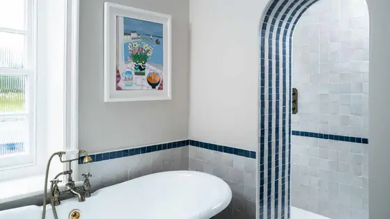 This Kitchen Tool is My Go-To for Eliminating Shower Mold