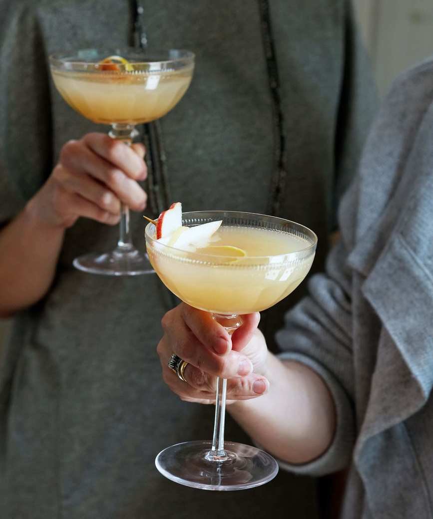 Hands holding refreshing cocktails
