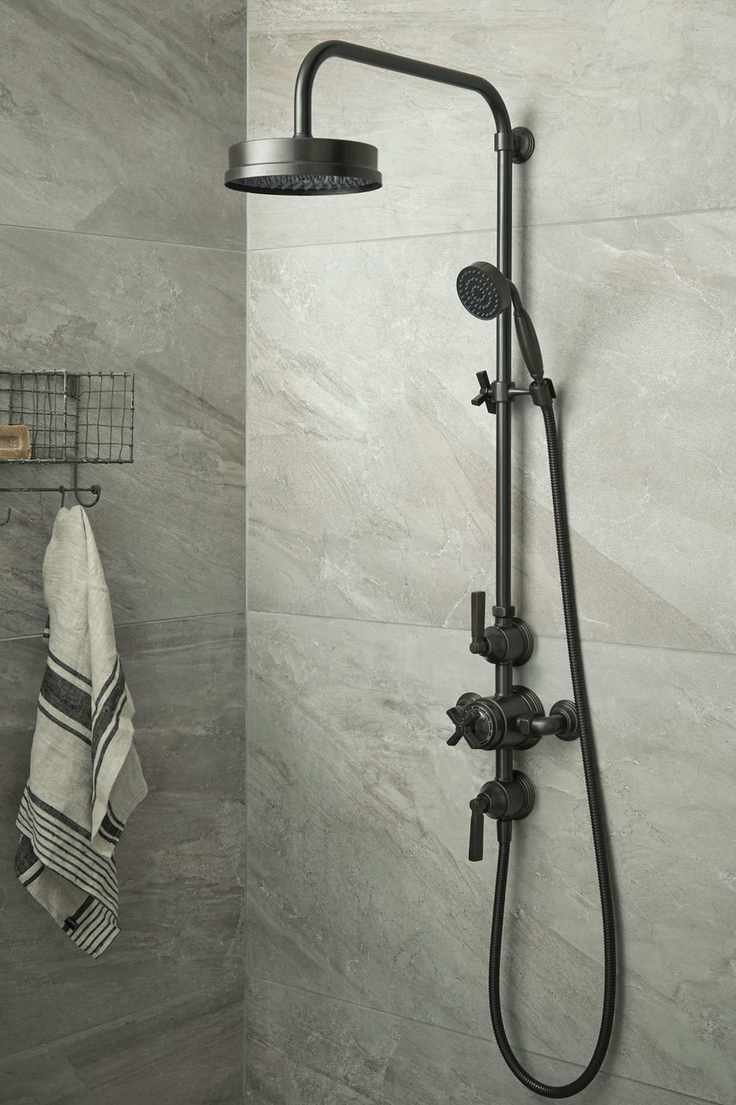 Fired Earth Empire Grande shower in a gray marble shower room.
