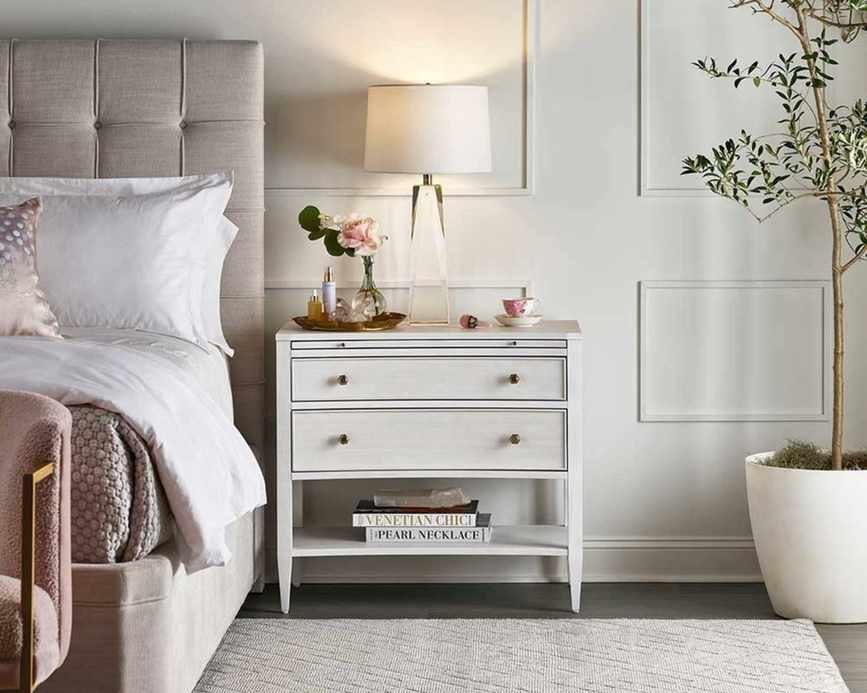Bedroom with double bed and large bedside table