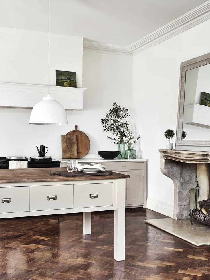 Traditional kitchen: cream kitchen with island and wooden floor