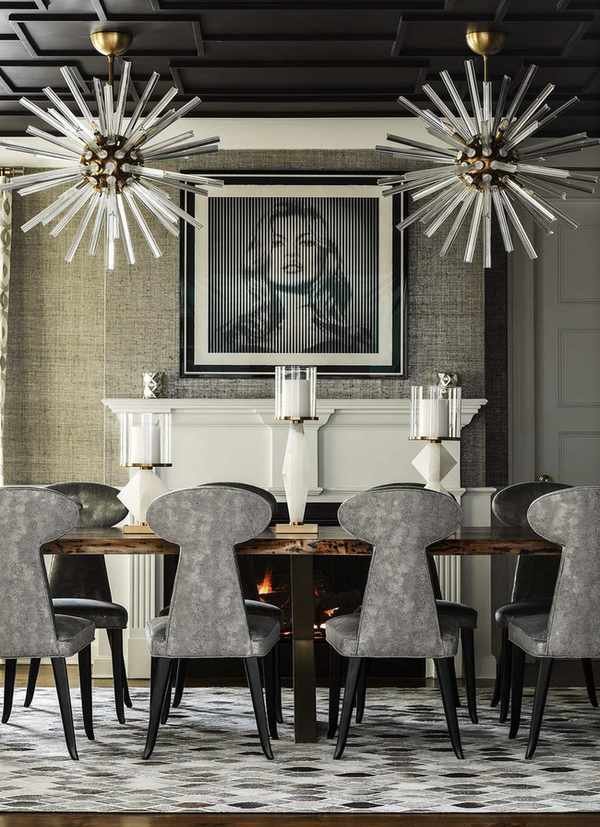bold dining room with two glass pendants, wallpaper, artwork, open fire, grey dining chairs, grey/black rug, black ceiling