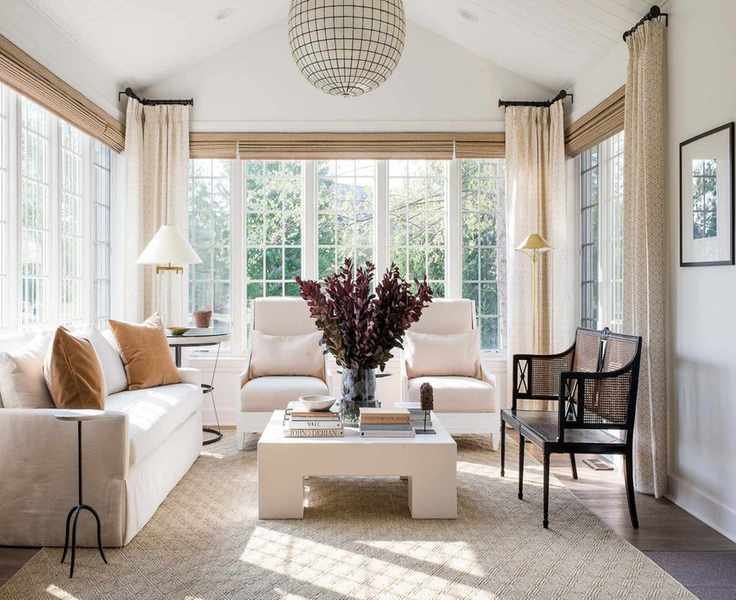 sun room wtih cream sofa and square coffee table