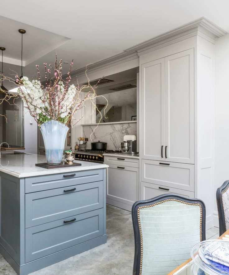 White kitchen with blue island