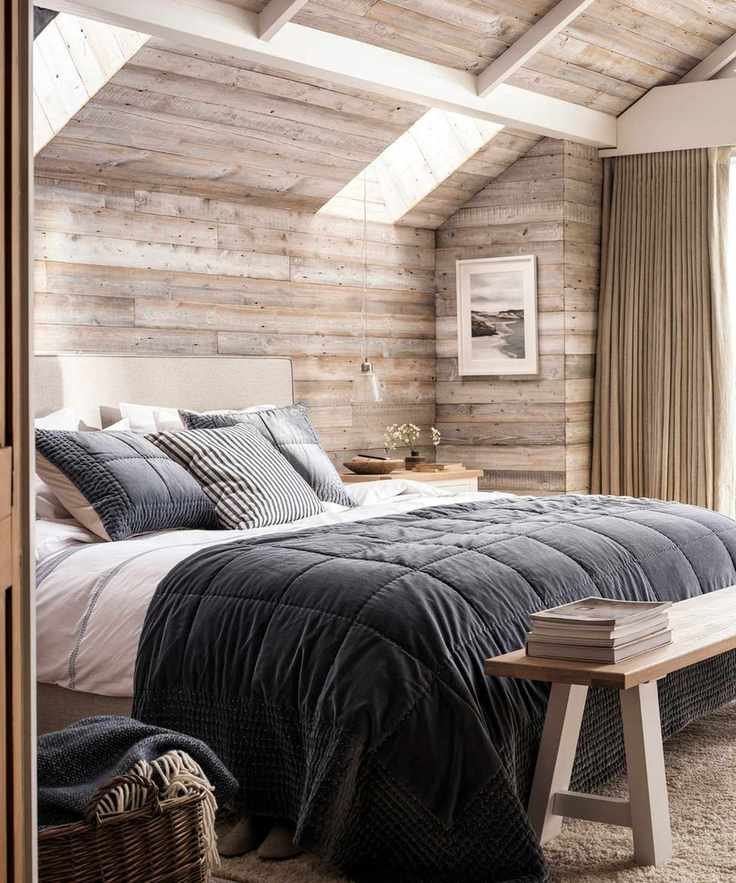 Churchill natural tweed bed in a wooden pannaled room, a wooden bench along the end of the bed