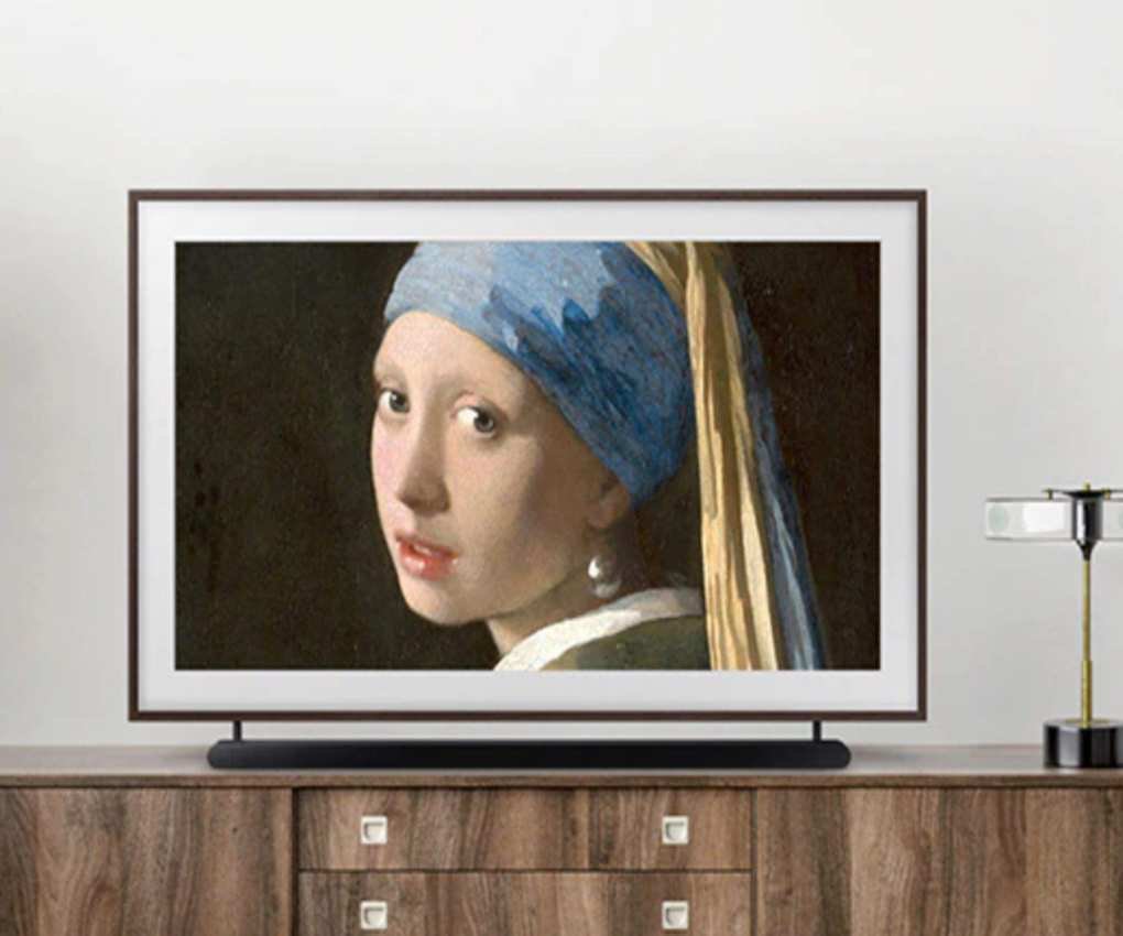 A smart TV on a hallway sideboard