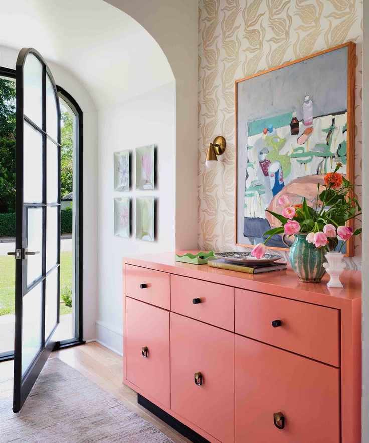 Hallway with red console table