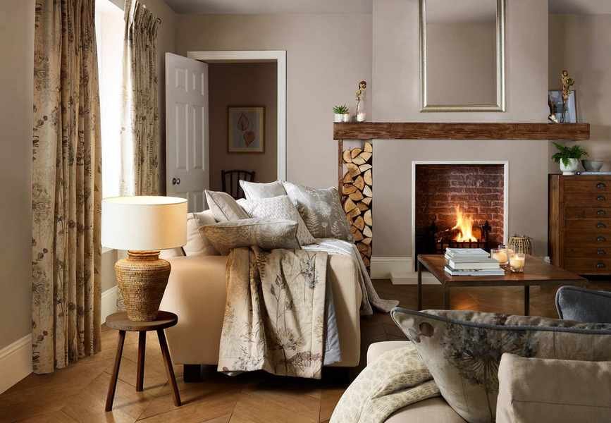 farmhouse country living room with fireplace and sofa