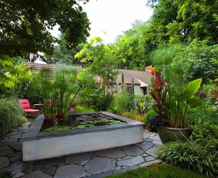raised square pond in small urban garden