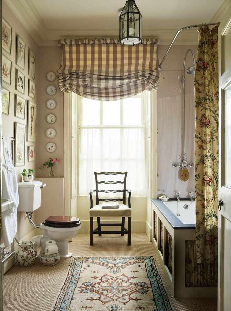 Country bathroom with wall plates, window treatment and chair