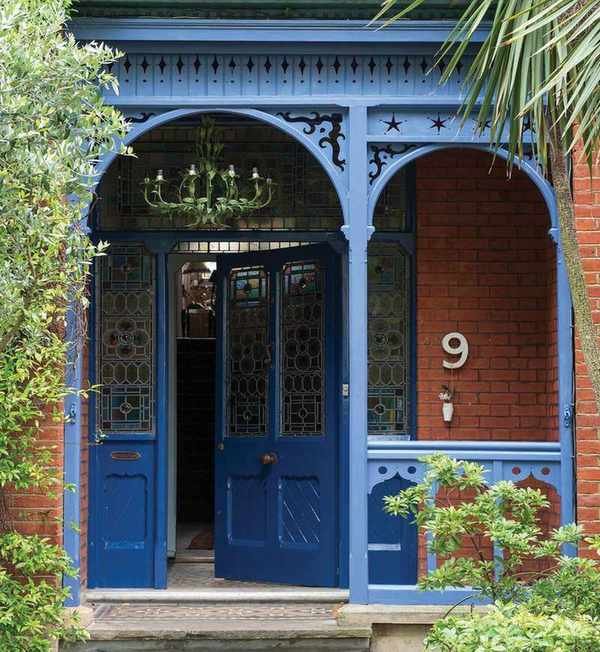 A traditional Victorian style front porch