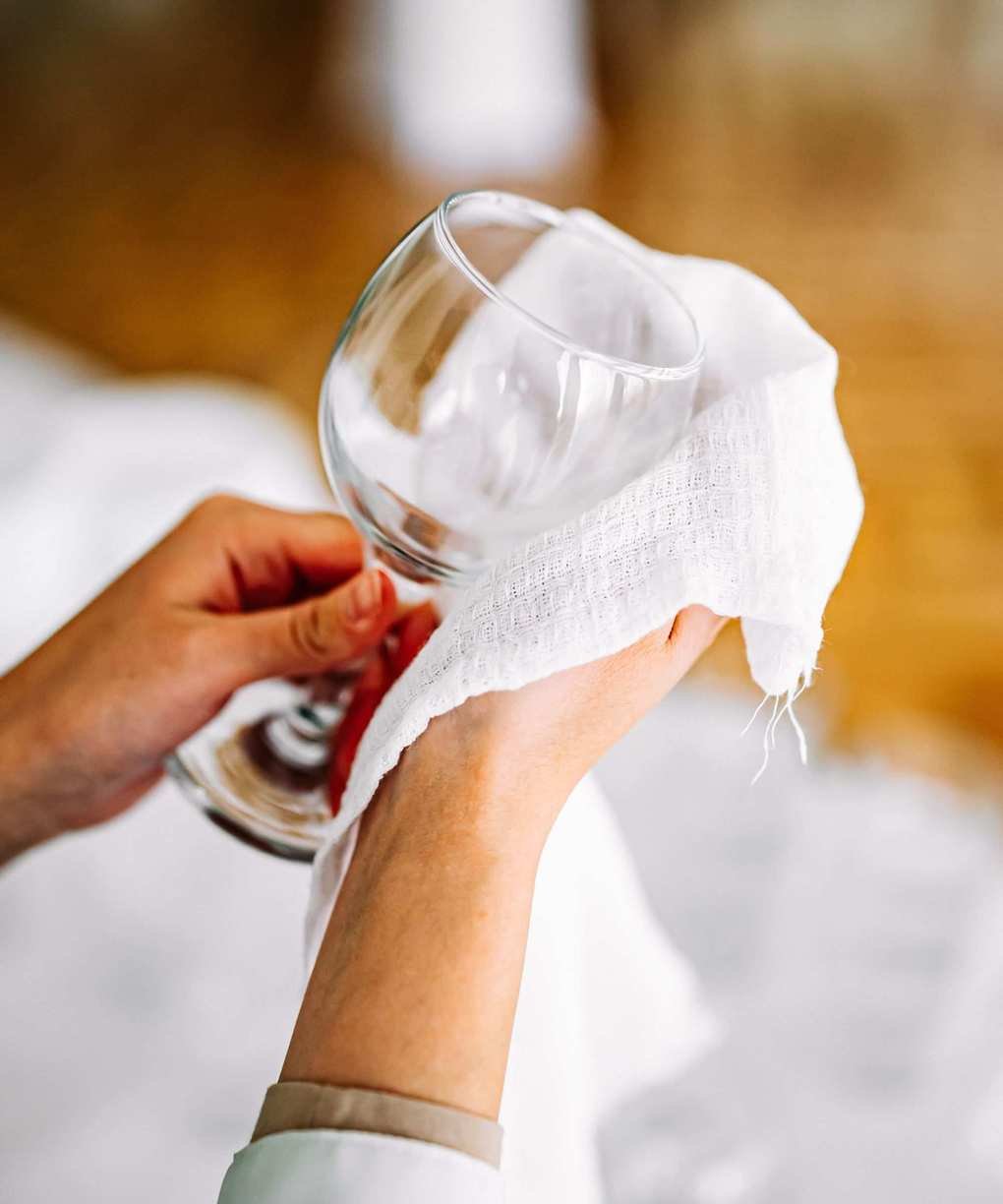 Hand drying wine glass