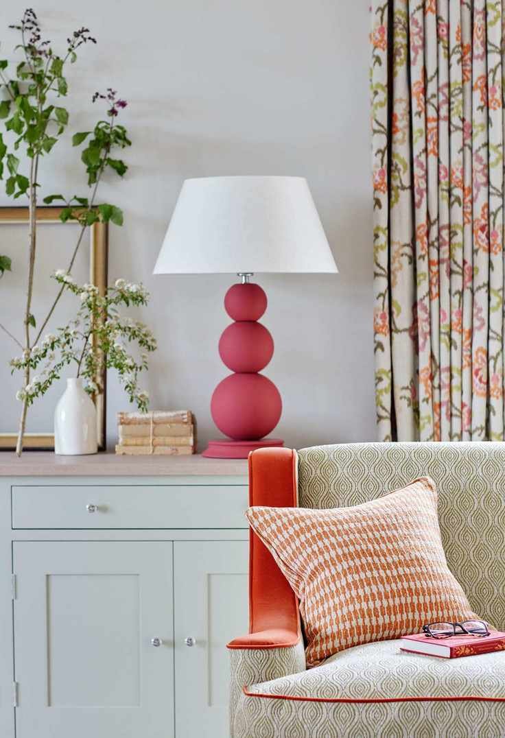 Stylish red lamp in a living room