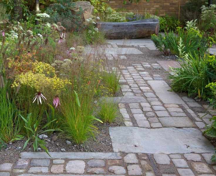Natural stone garden path with permeable surfaces