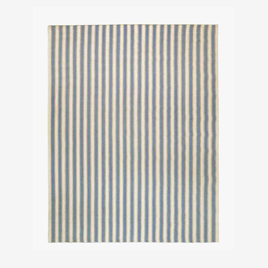 Blue, white and red striped outdoor rug