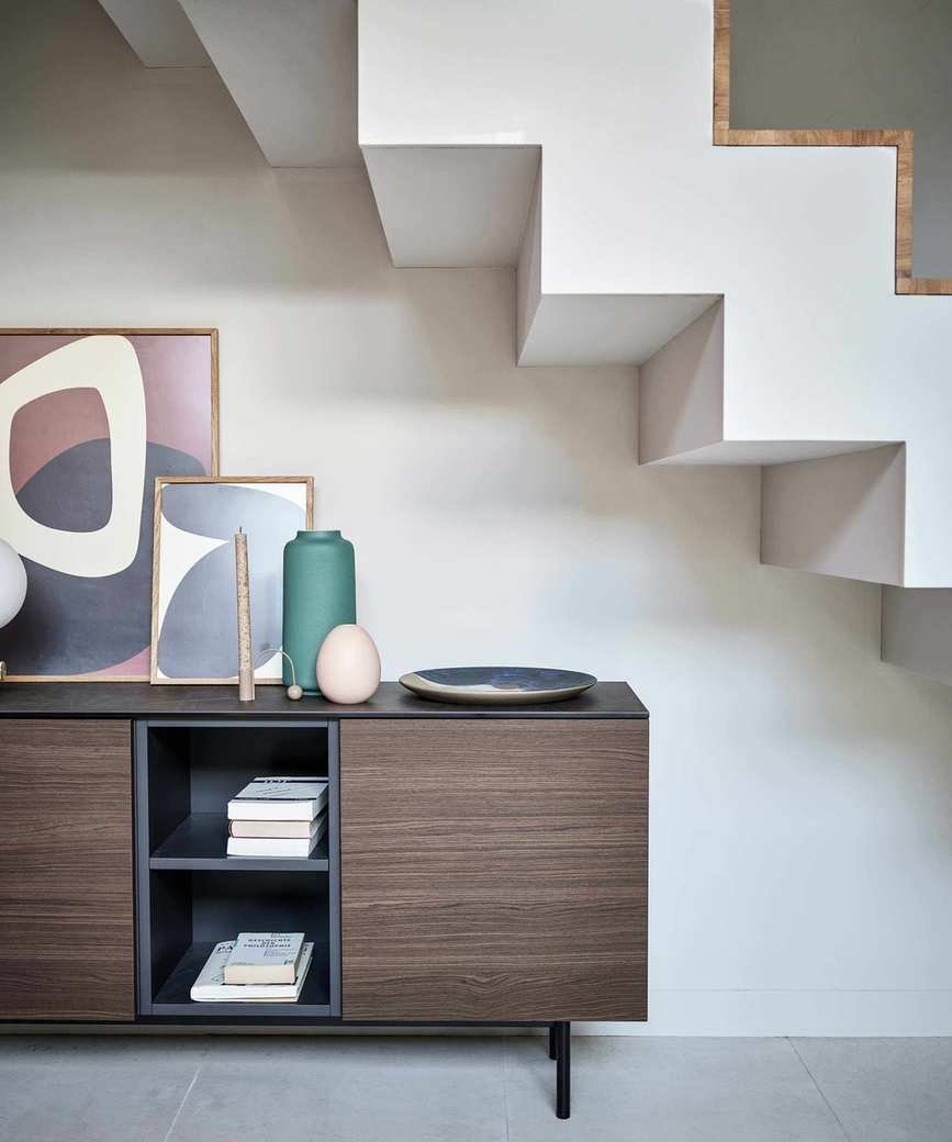 Storage baskets under staircase
