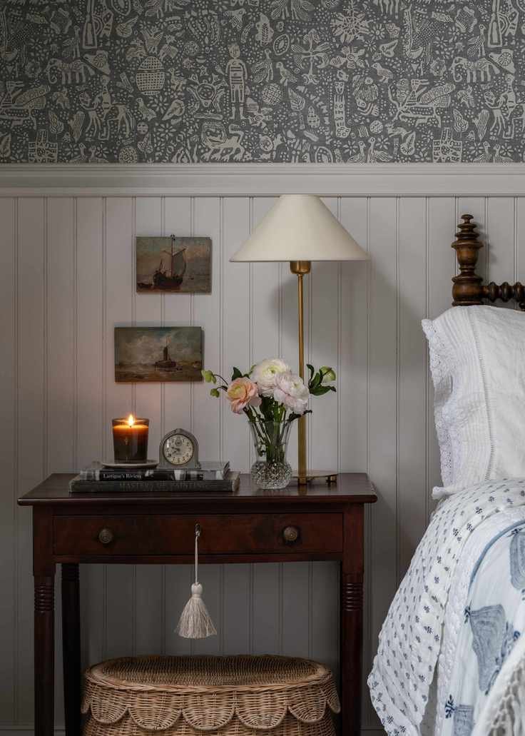 Cozy bedroom with walnut nightstand and rattan dresser
