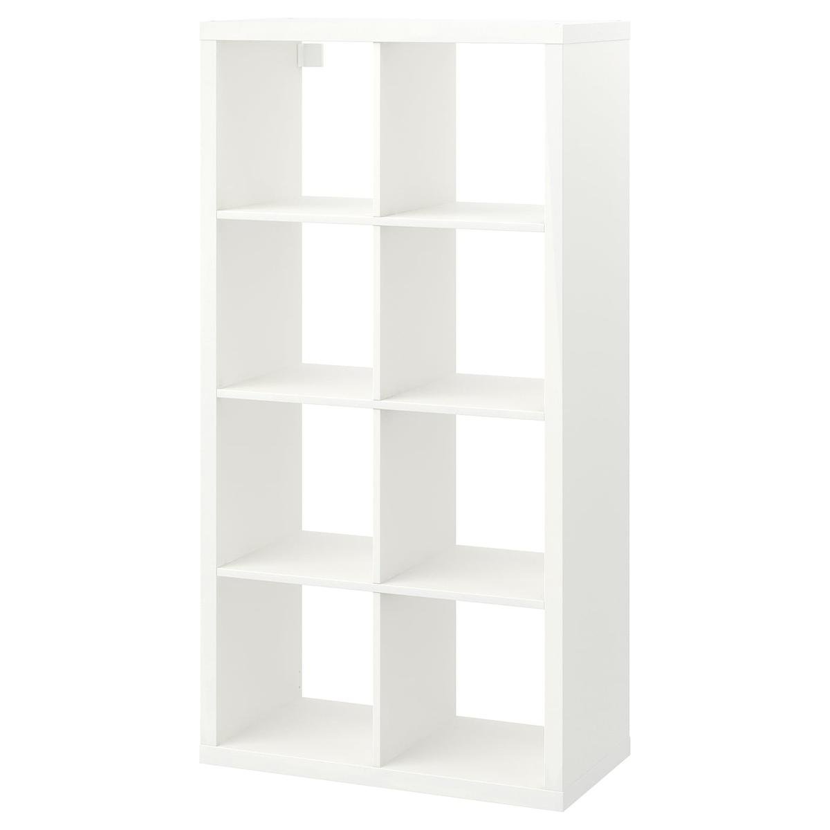 A white open shelving unit with square cubby holes