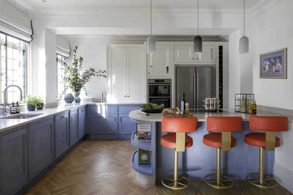 Kitchen with red bar stools
