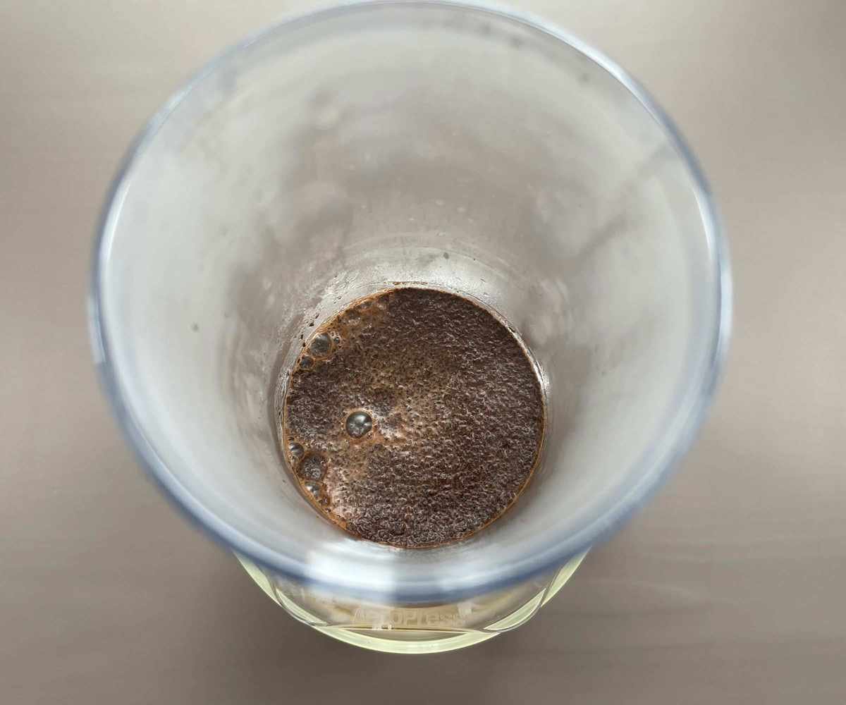 Blooming coffee grounds in the AeroPress during brewing