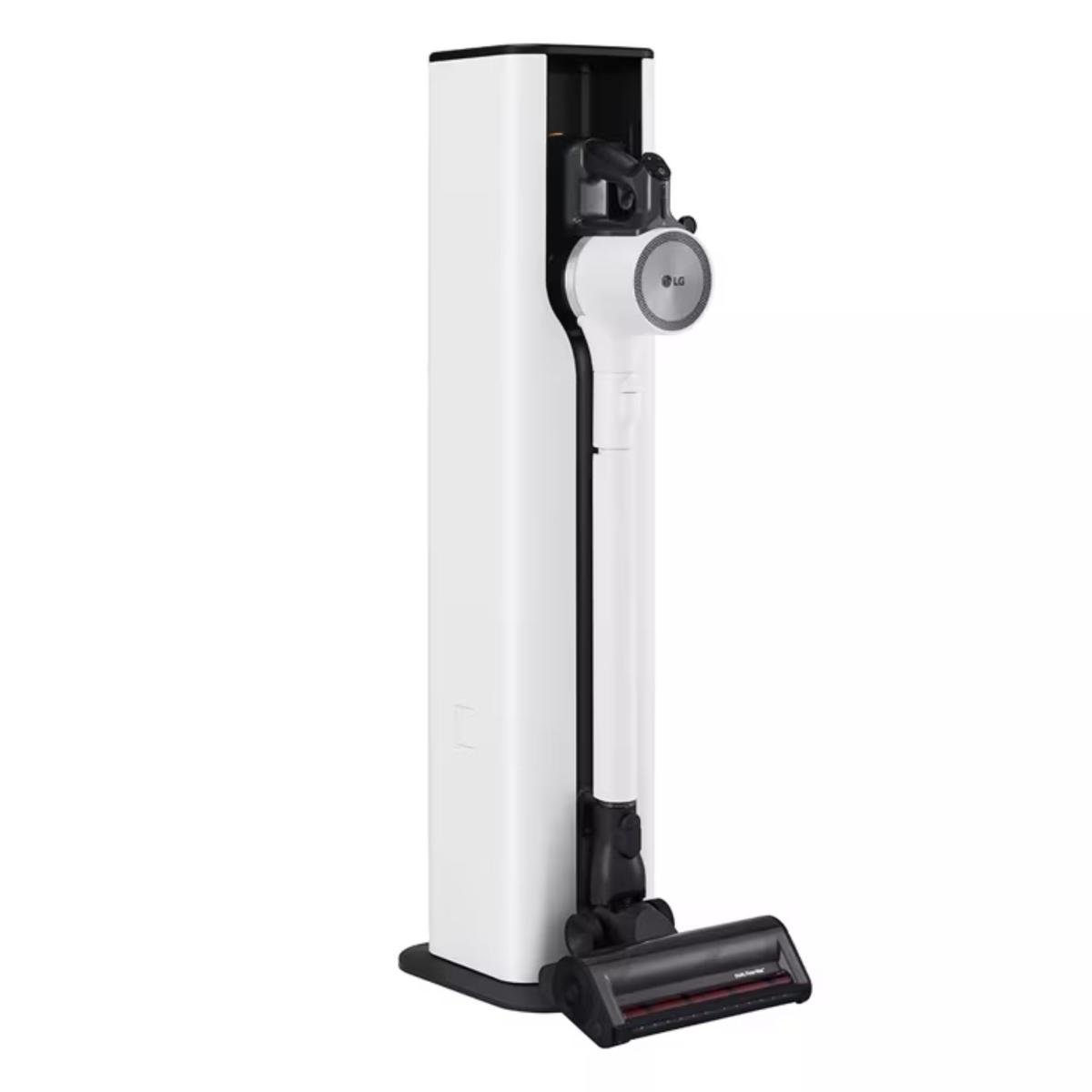 A self-emptying stick vacuum in a white and black dock