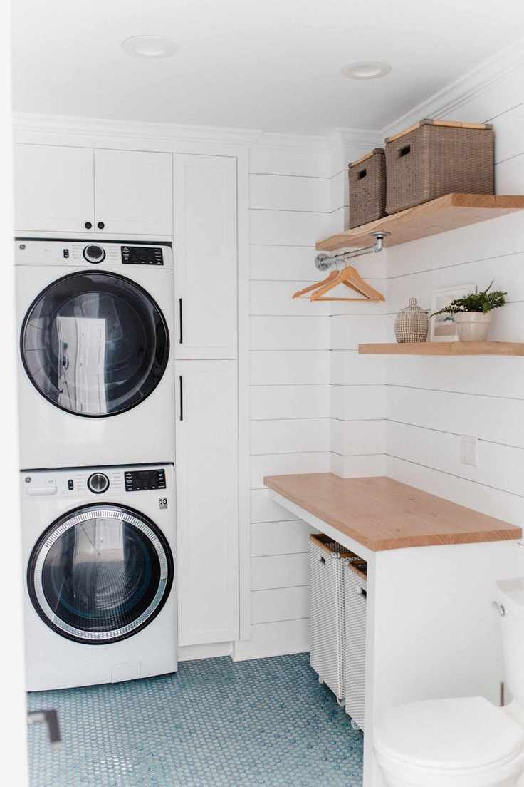 laundry room with white cabinets