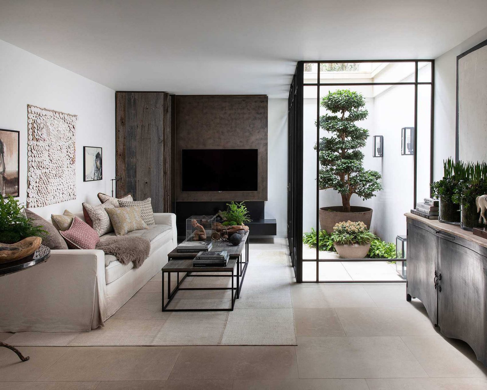 Beige living room with white walls and wooden accents