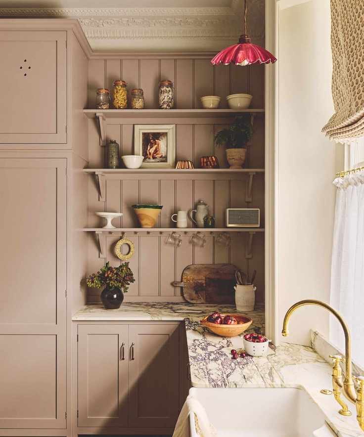 dusty pink lilac traditional shaker kitchen with marble countertops