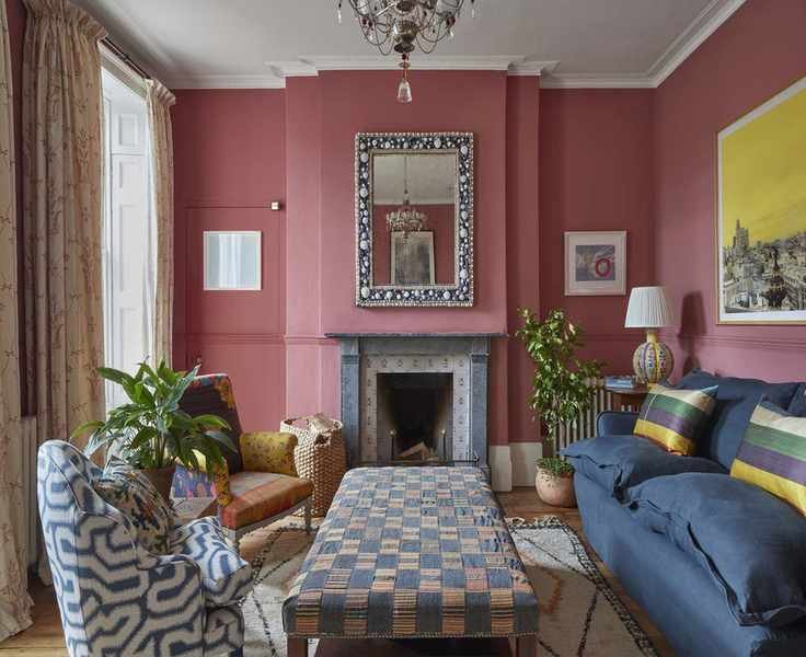 Traditional living room with pink walls