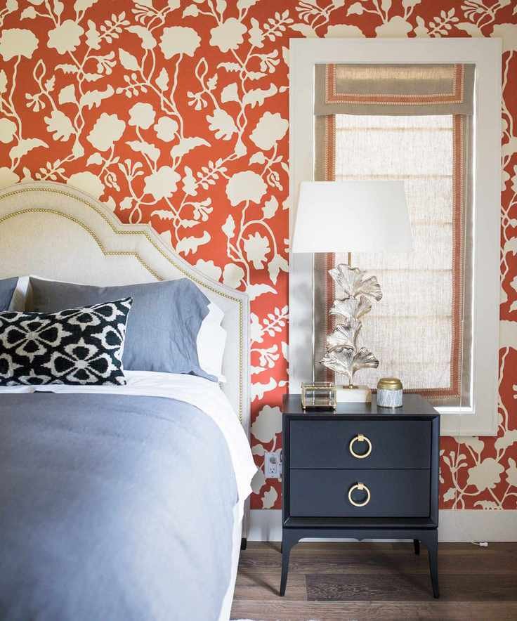 Orange bedroom with trellis wallpaper