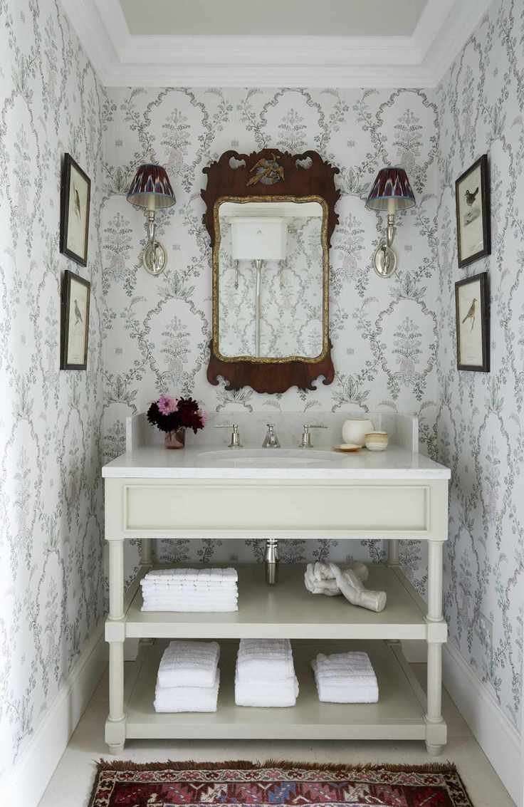 Plant pattern wallpaper, cream and white sink shelves