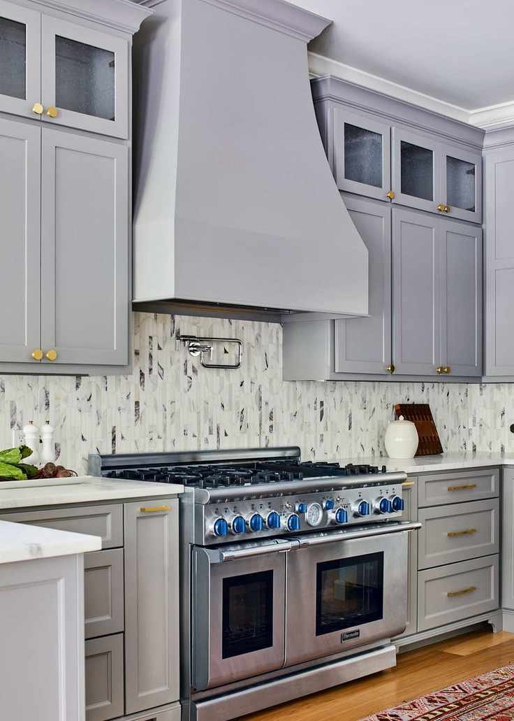 Oversized extractor hood in traditional kitchen