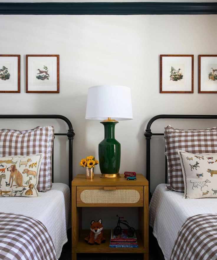 vintage twin bed kids bedroom with vintage art