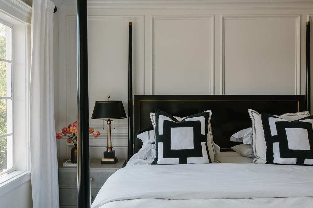 White bedroom with black accents