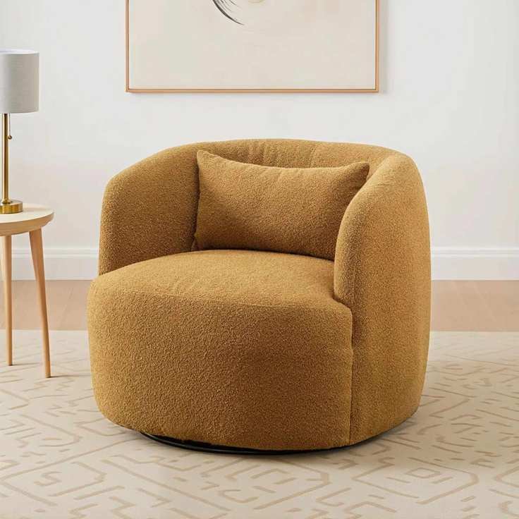Pale orange boucle arm chair