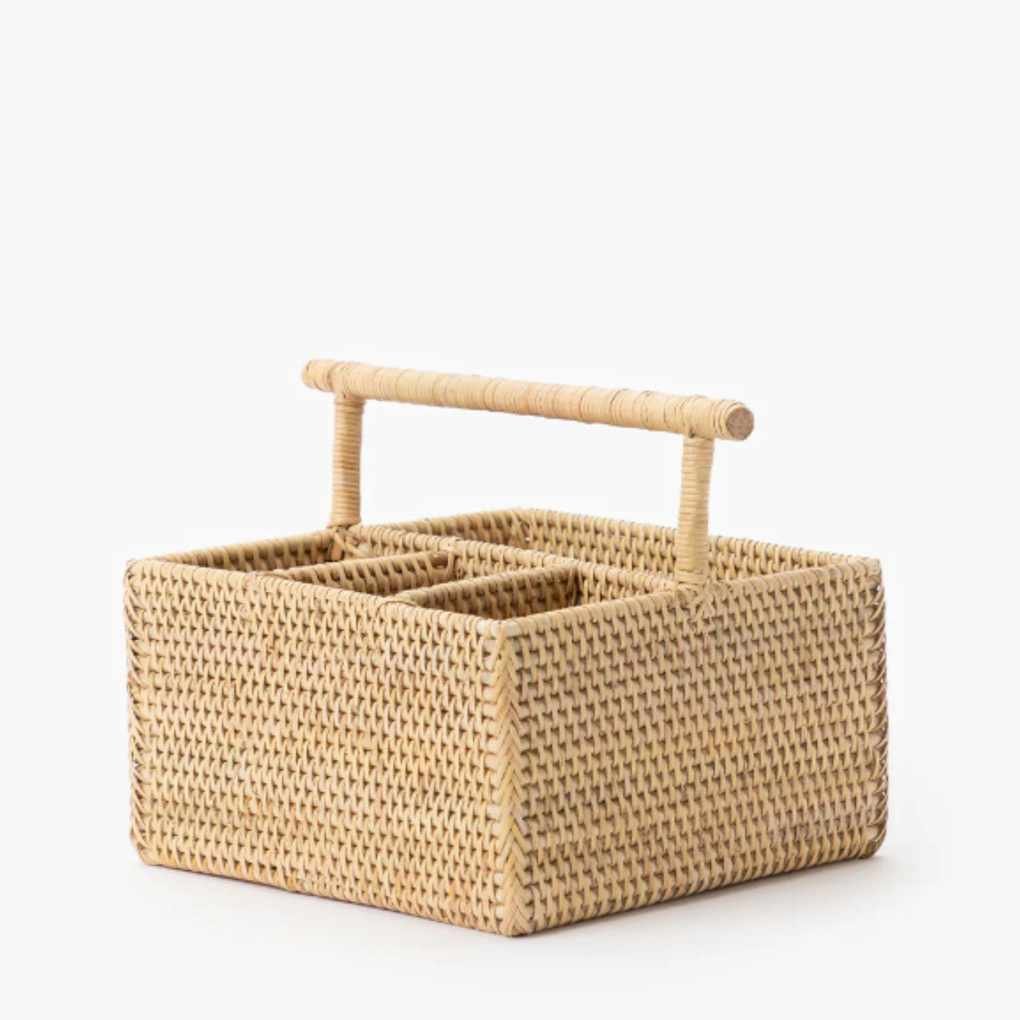 rattan utensil caddy on white background