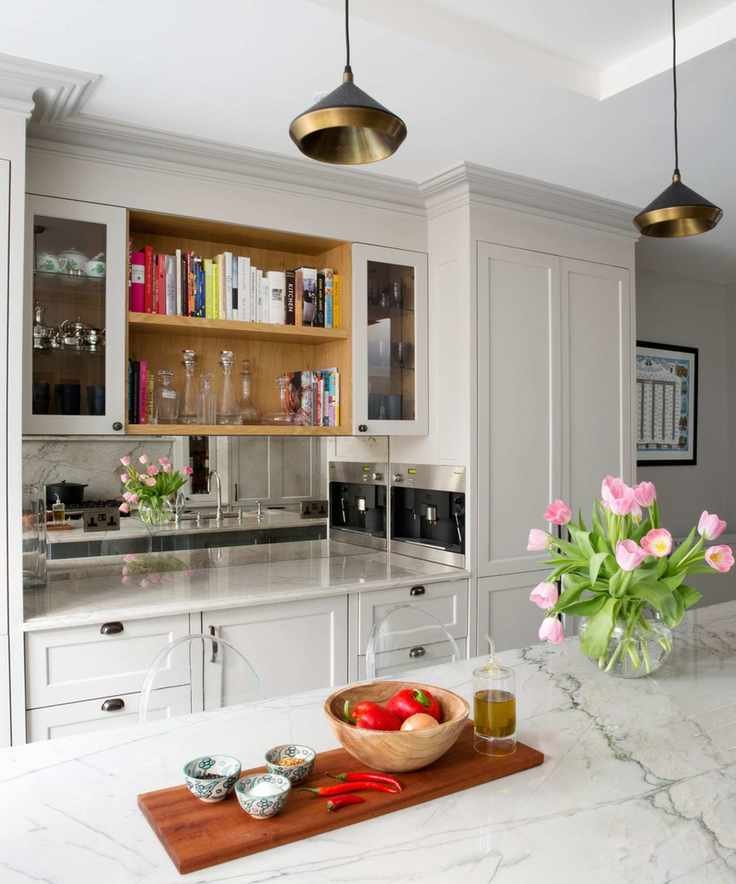 A modern kitchen with marble countertops