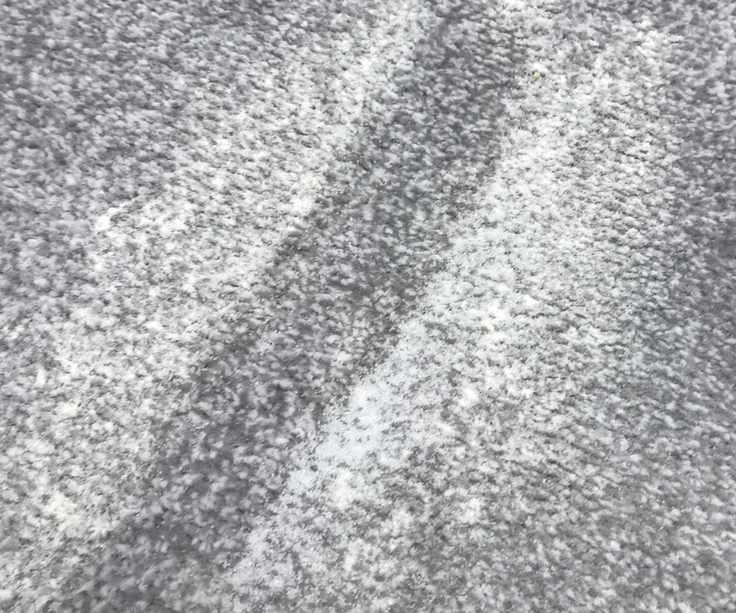 Brigii Handheld vacuum vacuuming flour and sugar on the carpet