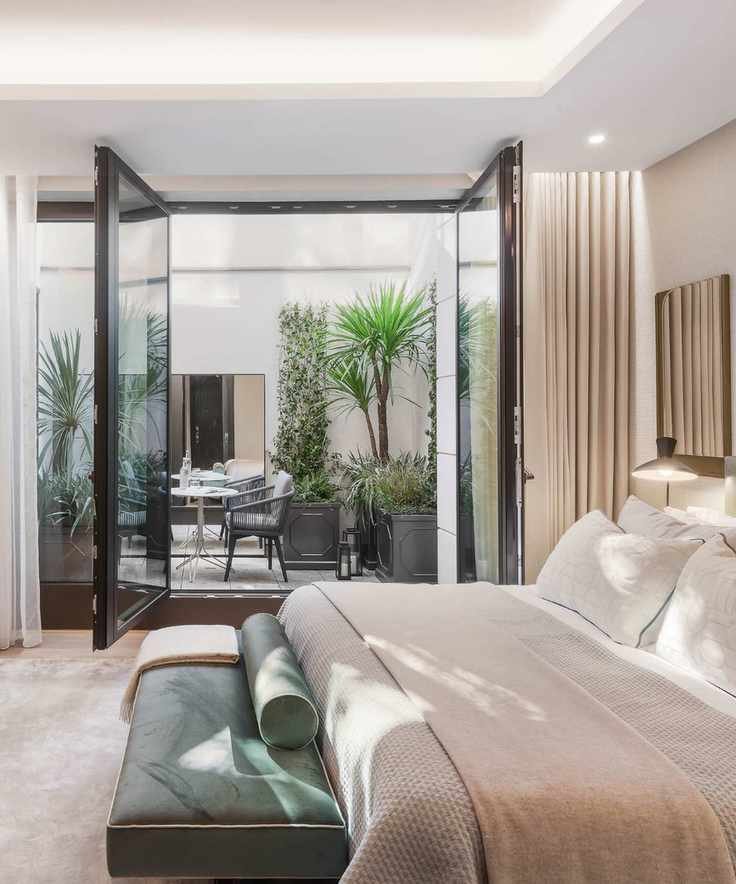 Bright bedroom with an outdoor terrace