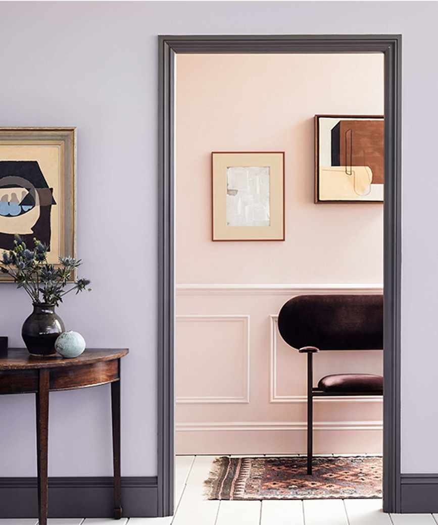 lilac hallway with grey woodwork and pink panelled adjoining room