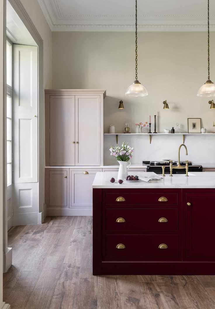 Harvey Jones pink kitchen with contrasting island color