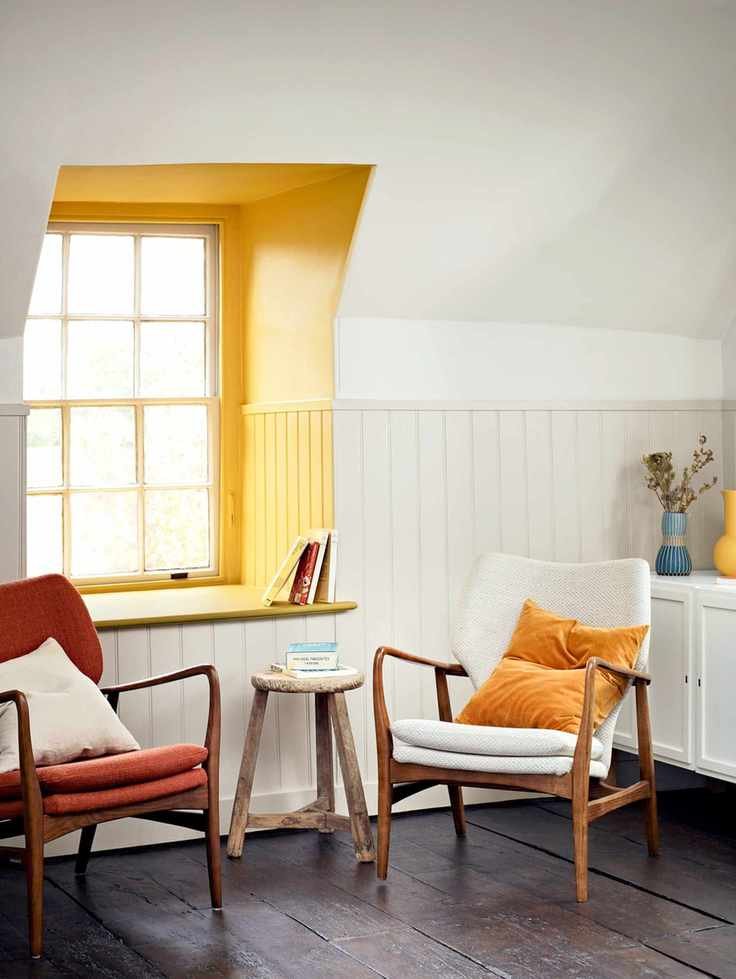 Living room with window alcove in Mustard Jar Breatheasy colored emulsion by Crown