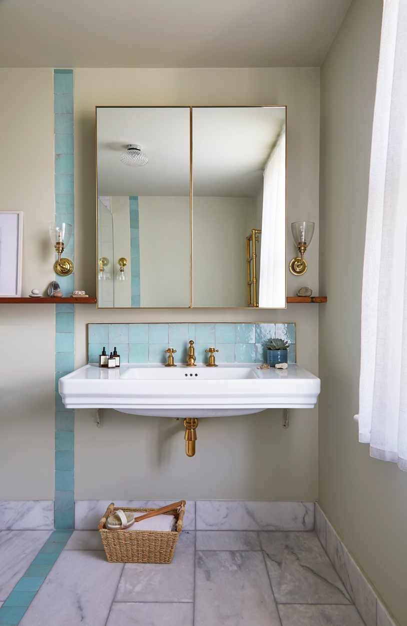 Neutral bathroom with pastel blue tiles