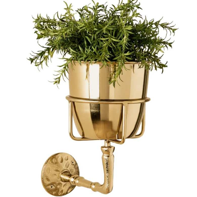 a wall mounted flower pot holder