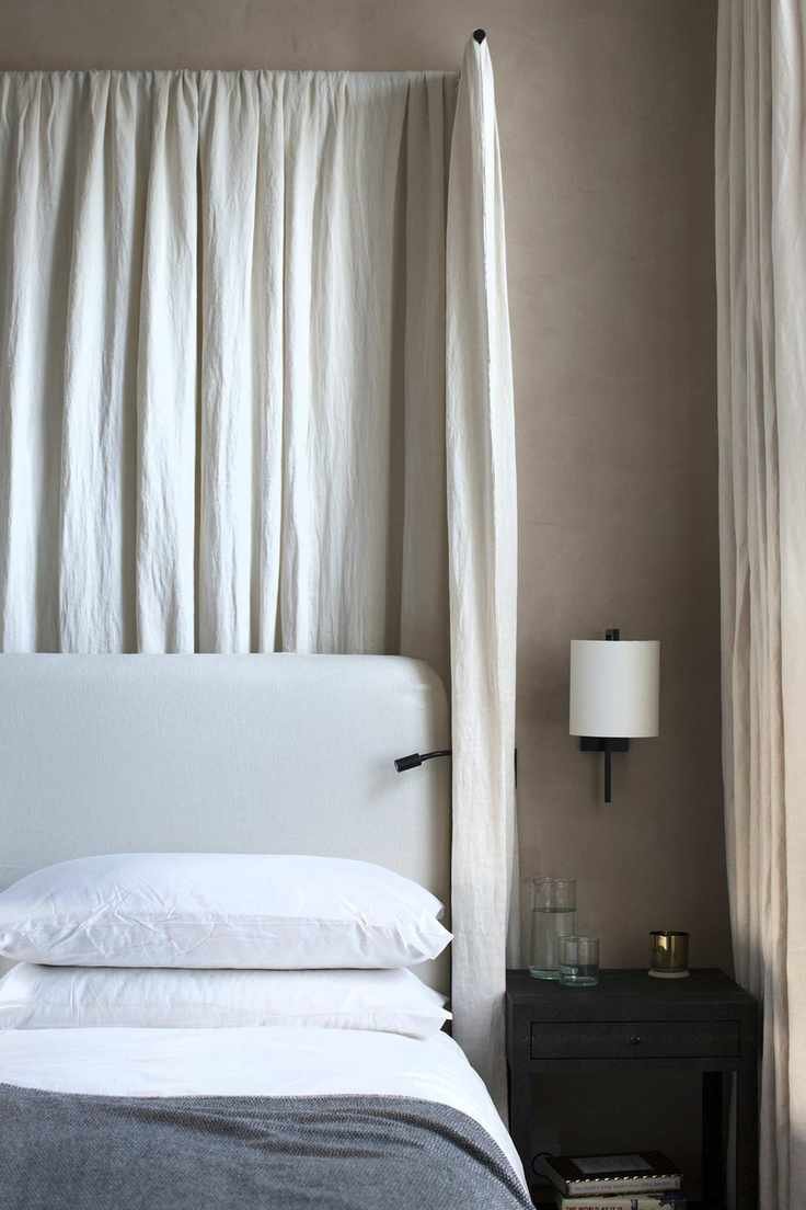 Bedroom by TR Studios with bed canopy by Riley Brooks