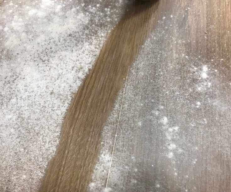 Brigii Handheld vacuum vacuuming flour off hardwood floor