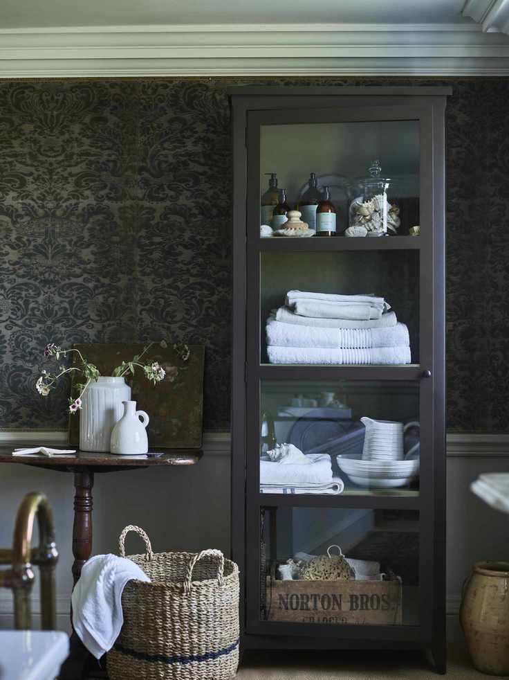 bathroom with glazed cabinet