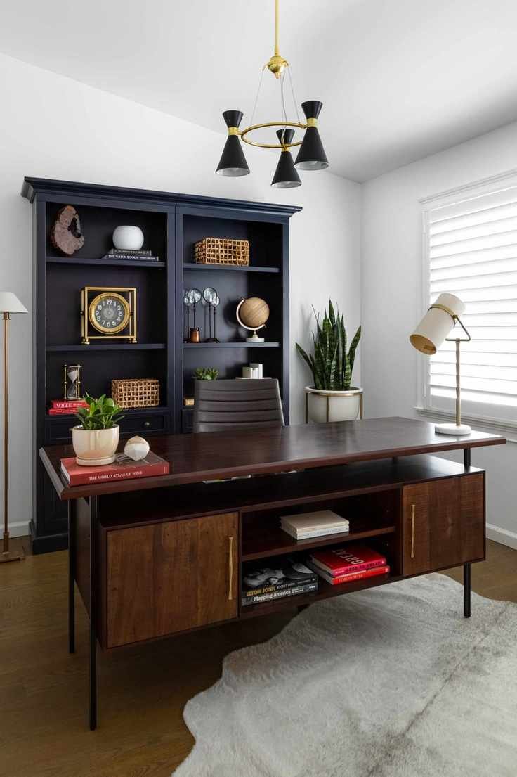 home office with freestanding desk and chair and shelving