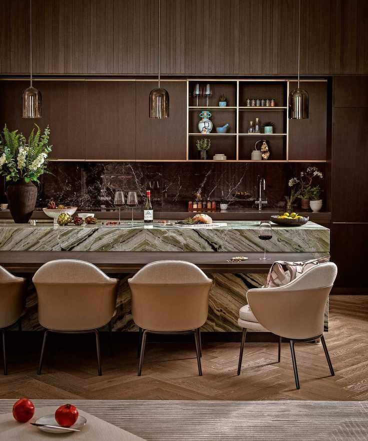 Brown kitchen with wood cabinets and marble surface