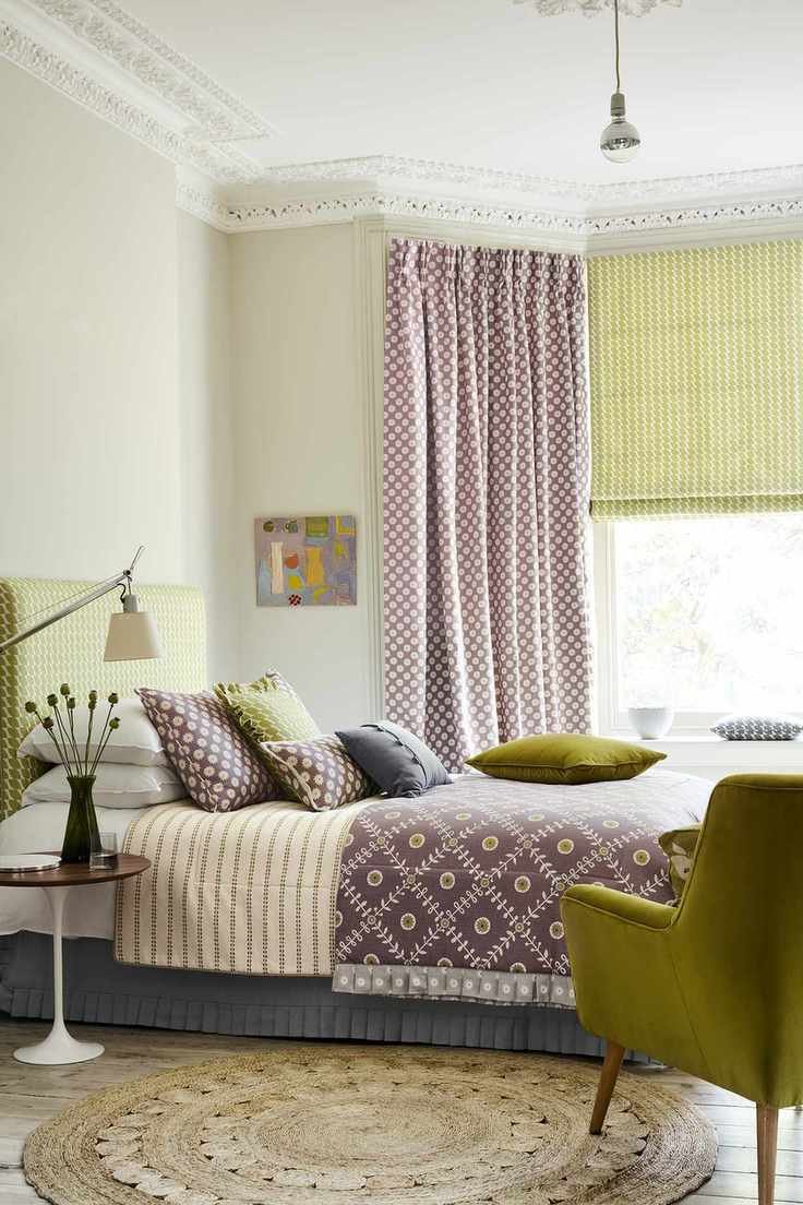 Blinds and full-length curtains in a patterned design